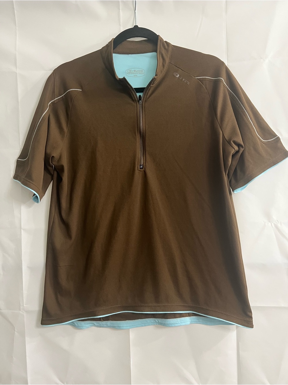 SUGOI Short Sleeve Quarter-Zip Polo in Brown with Light Blue Trim